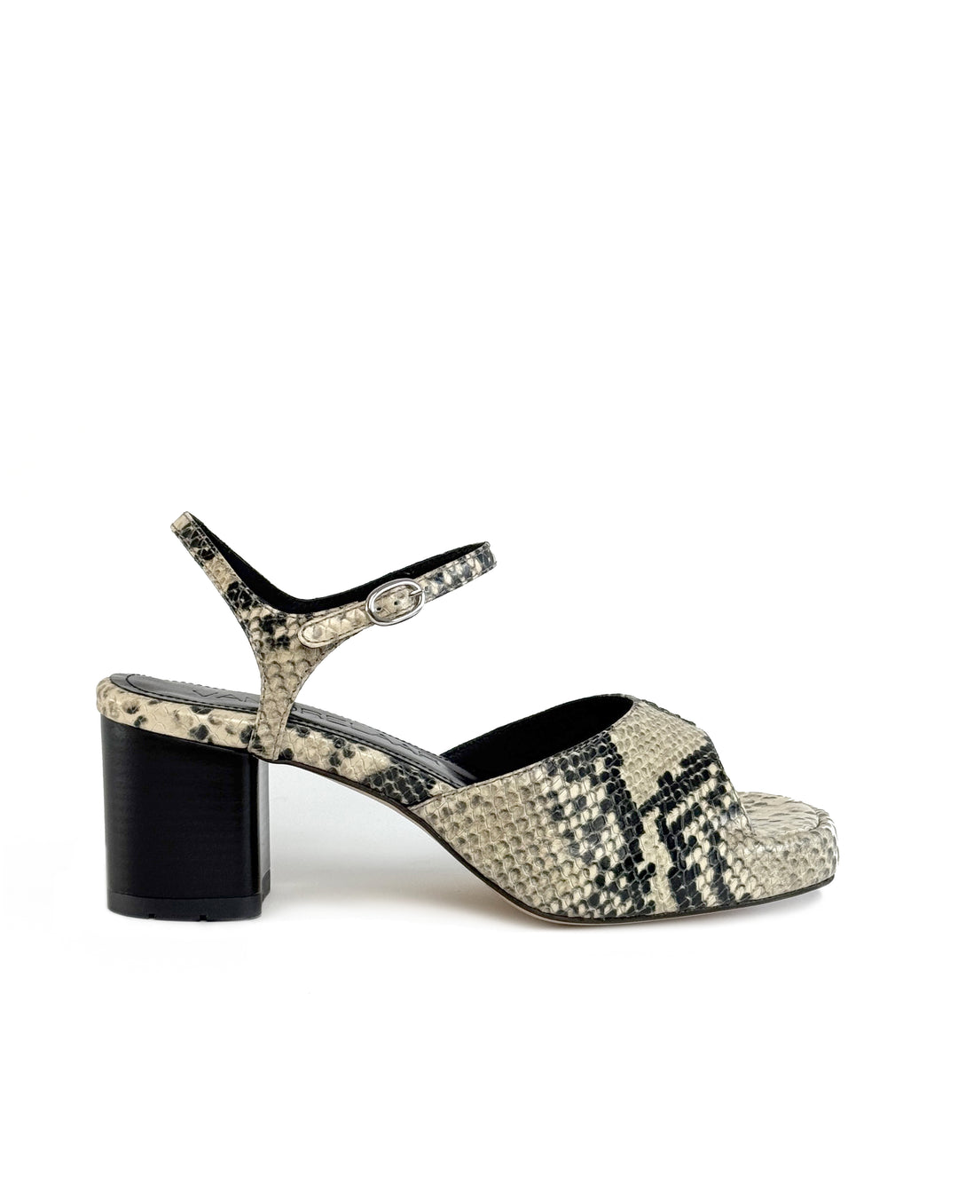 Women's mid-heel block heel open toe sandal with a concealed hidden platform of 2cm (3/4 inch) height and a stacked effect sturdy block heel of 6.5cm (2 3/4 inch) height. The elegant, minimal and timeless sandals comes with a dainty ankle strap that is elasticated to provide additional comfort. The insole is cut to a square toe shape and is fully padded for ultimate all-day comfort. This is the perfect 90's inspired cool girl sandal to wear all spring summer! Made from premium shiny python leather.