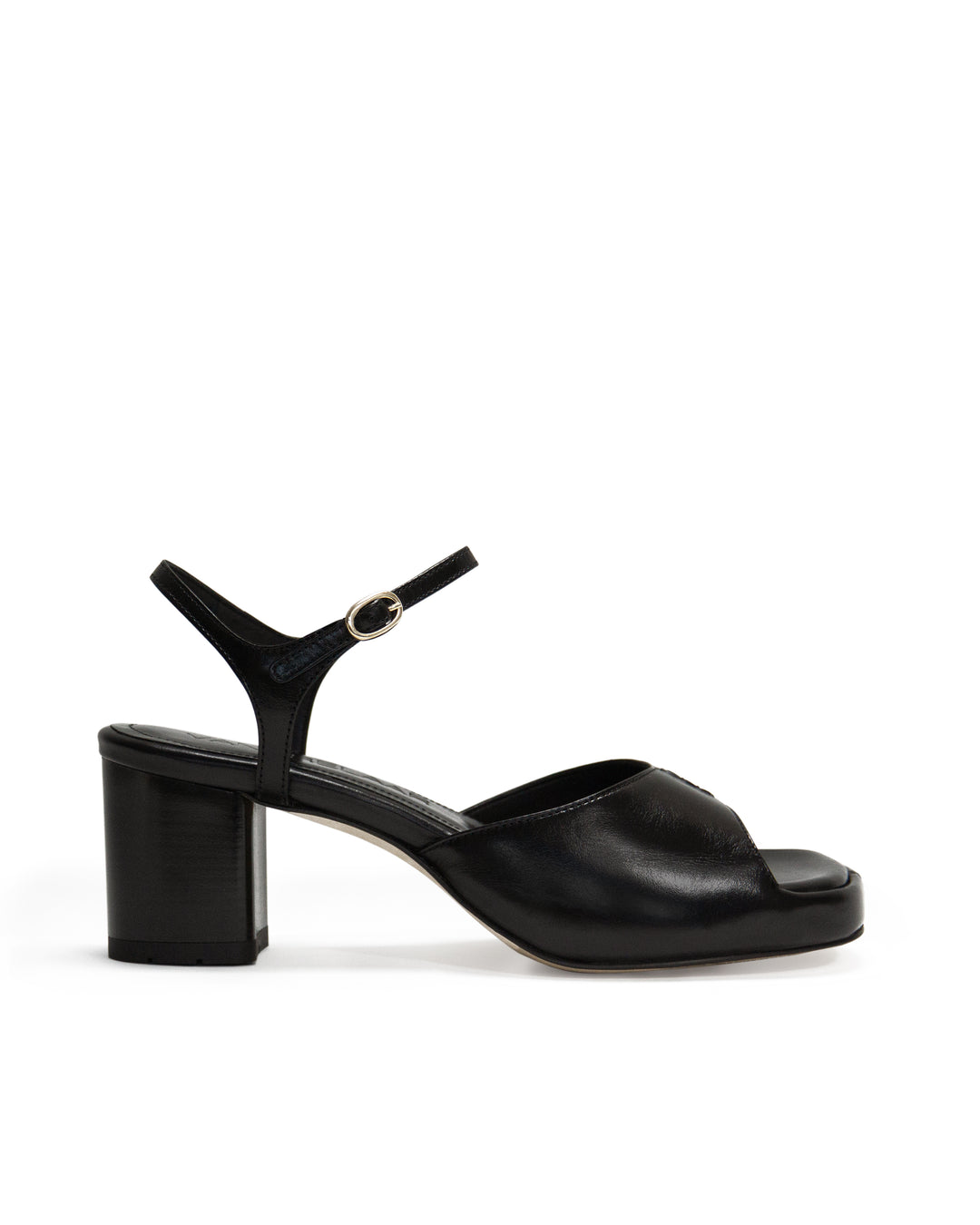 Women's mid-heel block heel open toe sandal with a concealed hidden platform of 2cm (3/4 inch) height and a stacked effect sturdy block heel of 6.5cm (2 3/4 inch) height. The elegant, minimal and timeless sandals comes with a dainty ankle strap that is elasticated to provide additional comfort. The insole is cut to a square toe shape and is fully padded for ultimate all-day comfort. This is the perfect 90's inspired cool girl sandal to wear all spring summer! Made from premium shiny black leather.